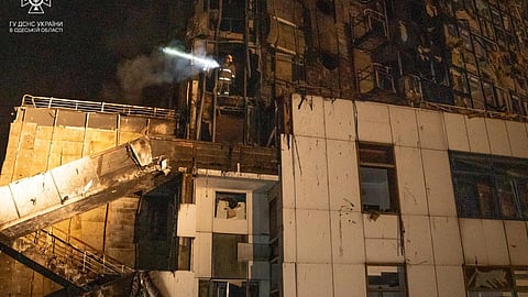 A firefighter works at a site of a hotel damaged by a Russian military attack, amid Russia's attack on Ukraine, in Odesa, Ukraine September 25, 2023. 