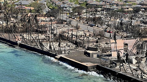 FILE PHOTO: The shells of burned houses and buildings are left after wildfires driven by high winds burned across most of the town in Lahaina, Maui, Hawaii, U.S. August 11, 2023. 