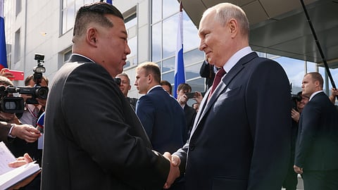 Russia's President Vladimir Putin shakes hands with North Korea's leader Kim Jong Un during a meeting at the Vostochny Сosmodrome in the far eastern Amur region, Russia, September 13, 2023. 