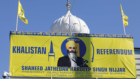 A sign outside the Guru Nanak Sikh Gurdwara temple is seen after the killing on its grounds in June 2023 of Sikh leader Hardeep Singh Nijjar, in Surrey, British Columbia, Canada September 18, 2023. 