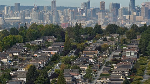 FILE PHOTO: Single family homes are seen against the skyline of Vancouver, British Columbia, Canada September 30, 2020. 