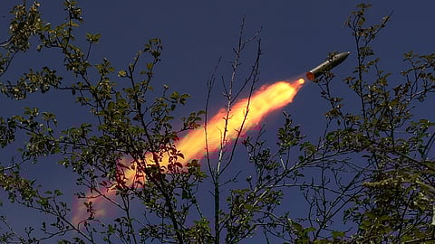 FILE PHOTO: Ukrainian servicemen fire a RAK-SA-12 small multiple launch rocket system towards Russian troops near the front line town of Bakhmut, amid Russia's attack on Ukraine, in Donetsk region, Ukraine July 10, 2023. 