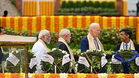 Prime Minister of India Narendra Modi, Brazil President Luiz Inacio Lula da Silva, U.S. President Joe Biden and UK Prime Minister Rishi Sunak visit Raj Ghat memorial with other G20 leaders, Sept. 10, 2023, in New Delhi. 