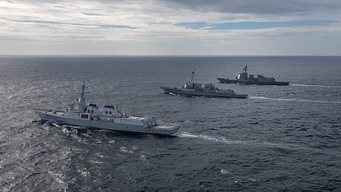 Se Jong Daewang class destroyer ROKS Yul Gog Yi I (DDG 992) of the Republic of Korea Navy and Atago class destroyer JS Maya (DDG 179) of the Japanese Maritime Self-Defense Force sail alongside the U.S. Navy's Arleigh Burke-class guided-missile destroyer USS John Finn (DDG 113) while conducting a trilateral ballistic missile defense exercise in the Sea of Japan July 16, 2023. 