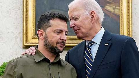 Ukrainian President Volodymyr Zelenskiy is embraced by U.S. President Joe Biden in the Oval Office of the White House in Washington, September 21, 2023. 