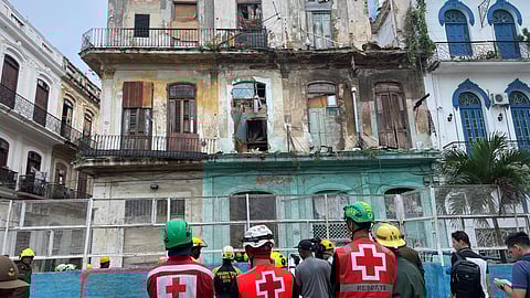 Emergency services work on the site where a residencial building collapsed in Havana, Cuba, October 4, 2023.