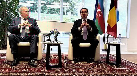 FILE PHOTO: Hikmet Hajiyev, foreign policy adviser to Azerbaijan's President Ilham Aliyev and Vaqif Sadiqov, Ambassador of the Republic of Azerbaijan to Belgium and Luxembourg and Head of Mission to EU talk to reporters in Brussels, Belgium September 26, 2023.