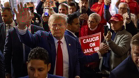 FILE PHOTO: Former U.S. President and Republican presidential candidate Donald Trump rallies with supporters at a "commit to caucus" event at a Whiskey bar in Ankeny, Iowa, U.S. December 2, 2023. 