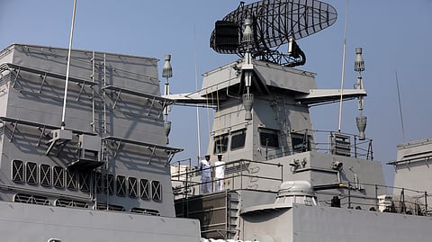 FILE PHOTO: Indian Navy officers stand on the deck of INS Mormugao, a stealth guided-missile destroyer ship of Project 15B, during its commissioning ceremony, in Mumbai, India, December 18, 2022. 
