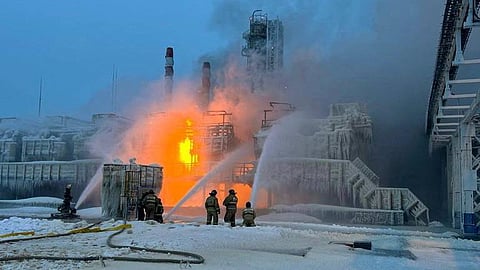 Firefighters work to extinguish fire at the Novatek terminal in the port of Ust-Luga, Russia, January 21, 2024. 
