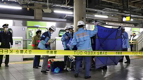 A person who believed to have been stabbed by a knife on the Yamanote loop train line is transported by ambulance members at JR Akihabara Station in Tokyo, Japan January 3, 2024, in this photo released by Kyodo. 


