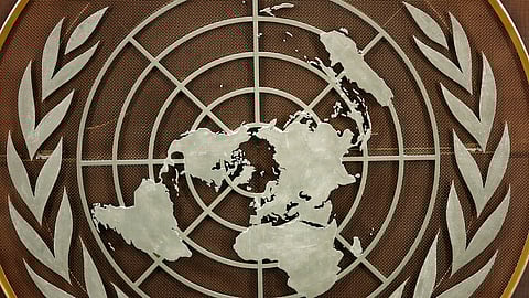 FILE PHOTO: The logo of the United Nations is seen in the General Assembly hall before heads of state begin to address the 76th Session of the U.N. General Assembly in New York City, U.S., September 21, 2021. 

