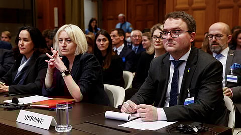 Ukrainian Foreign Ministry's Director General for International Law Oksana Zolotaryova and Ambassador-at-large Anton Korynevych look on as the International Court of Justice (ICJ), also known as the World Court, rules on Russia's request to throw out the Ukraine genocide case in The Hague, Netherlands, February 2, 2024. 