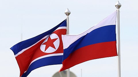 FILE PHOTO: Russian and North Korean flags fly at the Vostochny Сosmodrome, the venue of the meeting between Russia's President Vladimir Putin and North Korea's leader Kim Jong Un, in the far eastern Amur region, Russia, September 13, 2023. 