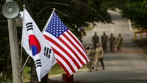 The South Korean and American flags fly next to each other at Yongin, South Korea, August 23, 2016. 