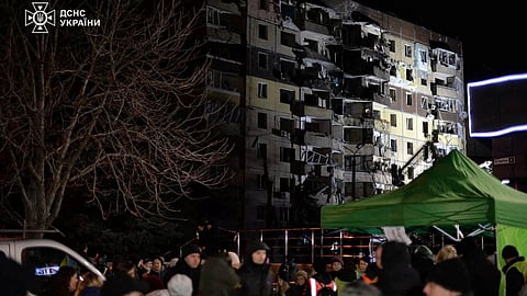 View of the damage on a building after a Russian missile slammed into two apartment buildings in the central Ukrainian city of Kryvyi Rih, March 12, 2024. 