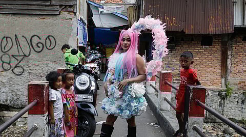 FILE PHOTO: Agustina, 41, a trans woman poses before a Trans Super Heroes fashion show at a traditional market in Jakarta, Indonesia, December 17, 2023. 