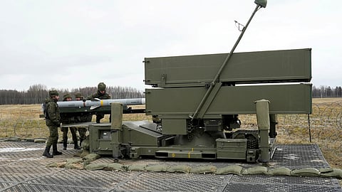 FILE PHOTO: Spanish army servicemen prepare NASAMS medium-range ground-based air defence rocket launcher, in Lielvarde air base, Latvia March 29, 2023. 