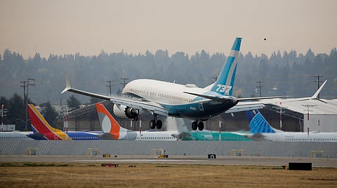 FILE PHOTO: A Boeing 737 MAX 7 aircraft piloted by Federal Aviation Administration (FAA) Chief Steve Dickson lands during an evaluation flight at Boeing Field in Seattle, Washington, U.S. September 30, 2020. 
