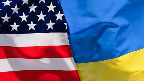 FILE PHOTO: The American and Ukrainian flags wave next to each during an Independence Day parade in Washington D.C., U.S., July 4, 2023. 