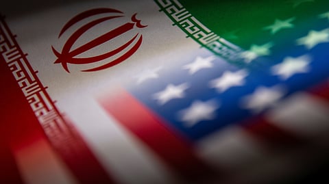 FILE PHOTO: Iran's and U.S.' flags are seen printed on paper in this illustration taken January 27, 2022. 