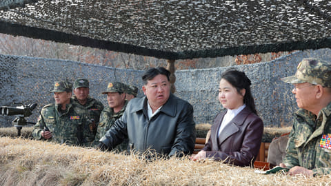 FILE PHOTO: North Korean leader Kim Jong Un and his daughter Kim Ju Ae attend a military demonstration in North Korea, in this picture released on March 16, 2024 by the Korean Central News Agency. 