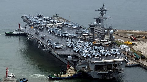 FILE PHOTO: A nuclear-powered U.S. aircraft carrier, the Theodore Roosevelt, arriving in the South Korean port city of Busan earlier this month to take part in joint military exercises with the host nation and Japan

