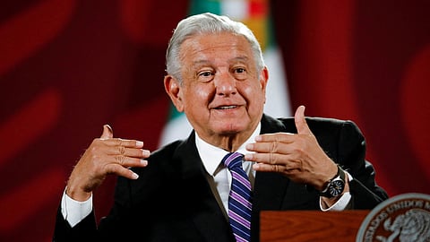 FILE PHOTO: Mexican President Andres Manuel Lopez Obrador gestures during a news conference at the National Palace in Mexico City, Mexico April 11, 2022. 