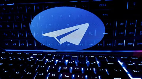 FILE PHOTO: A keyboard is placed in front of a displayed Telegram logo in this illustration taken February 21, 2023. 