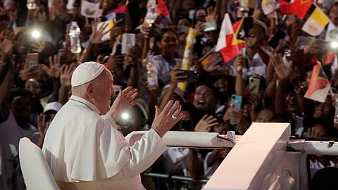 Pope Francis gestures as he leaves after leading a holy mass at Tasitolu park in Dili, East Timor, Tuesday, Sept. 10, 2024. 