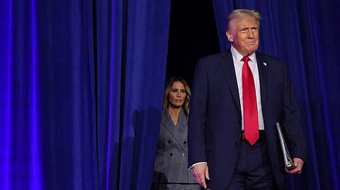 Republican presidential nominee and former U.S. President Donald Trump and his wife Melania take the stage for his election night rally at the Palm Beach County Convention Center in West Palm Beach, Florida, U.S., November 6, 2024. 