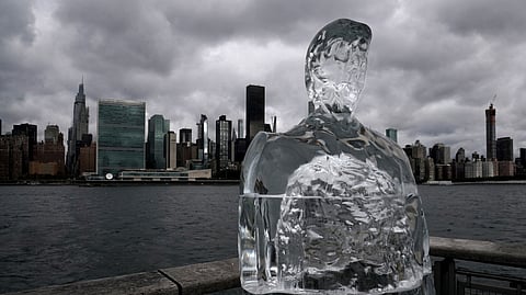 FILE PHOTO: An ice sculpture depicting U.S. President Donald Trump sits across the Hudson River from the United Nations headquarters in the Queens Borough of New York City, New York, U.S., September 30, 2020. 