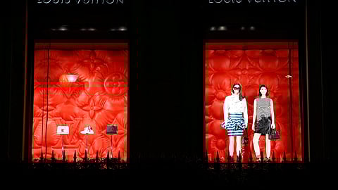 FILE PHOTO: Louis Vuitton logo is seen outside a store in Paris, France, January 27, 2020. 
