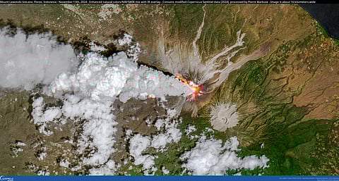 A composite enhanced natural colour and infra-red satellite image shows a column of smoke spewing out of a volcano in Mount Lewotobi, Flores, Indonesia, November 13, 2024. 