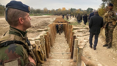 A training session involving some 2,000 Ukrainian conscripts and veterans takes place in the muddy fields of the Champagne military camp in eastern France, November 14, 2024. 