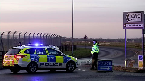 FILE PHOTO: British police stand guard at the entrance to the US Air Force base at RAF Mildenhall, Suffolk, Britain December 18, 2017. 