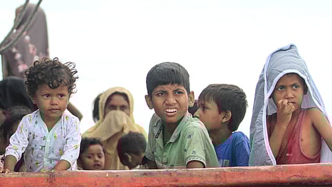 Rohingya refugee children are seen on a boat, after Rohingya refugees, mostly women and children, got stranded due to a boat engine failure in the waters of South Aceh, Aceh province, Indonesia, October 20, 2024, in this photo taken by Antara Foto. 