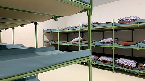Bunk beds are seen in the atomic shelter underneath the civil protection building in Gollion, Switzerland, December 12, 2024.