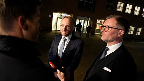 Sanjay Shah's defence attorneys Mikael Skjoedt and Kaare Pihlmann speak to media as court delivered a ruling in the criminal case against British-Indian businessman on tax fraud, in Glostrup, Denmark, December 12, 2024. 