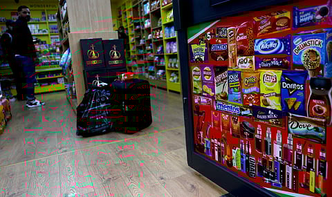 FILE PHOTO: Disposable vapes are advertised on a shop door, Newcastle-under-Lyme, Britain, September 14, 2023. 