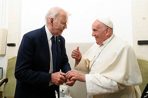 FILE PHOTO: Pope Francis and U.S. President Joe Biden meet as they attend the G7 summit, in Savelletri, Italy June 14, 2024. 