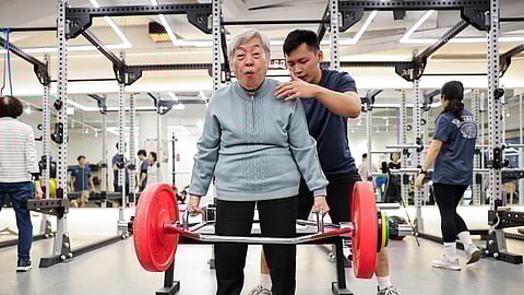 Cheng Chen Chin-Mei, 90, practices at the gym ahead of a weightlifting competition in Taipei, Taiwan December 17, 2024. 