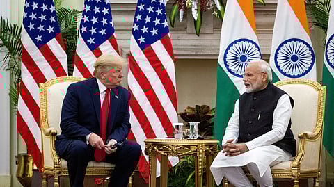 FILE PHOTO: Indian Prime Minister Narendra Modi speaks to U.S. President Donald Trump during a meeting at Hyderabad House in New Delhi, India, February 25, 2020.