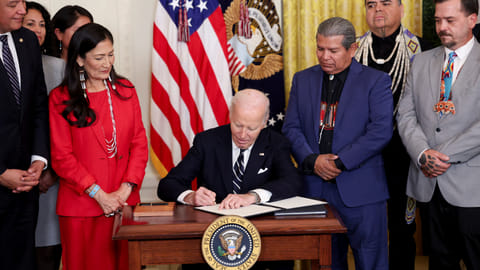 U.S. President Joe Biden signs a proclamation establishing Chuckwalla National Monument, at the White House in Washington, U.S., January 14, 2025. 