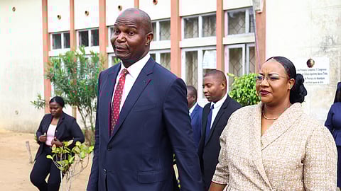 FILE PHOTO: Daniel Chapo, presidential candidate of the ruling Frelimo party leaves with his wife, Gueta Chapo after casting their vote during the general elections at Inhambane, in southern Mozambique, October 9, 2024. 
