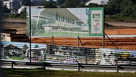 FILE PHOTO: A billboard shows an image of a project at the construction site for COP30 Summit in Belem, Para State, Brazil August 10, 2023. 