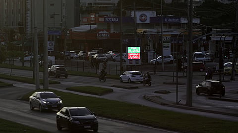 FILE PHOTO: Ethanol and gasoline price are displayed at a Petrobras gas station in Rio de Janeiro, Brazil April 8, 2022. 