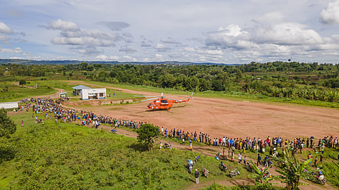 FILE PHOTO: A general view shows a United Nations Humanitarian Air Service (UNHAS) helicopter managed by the World Food Programme (WFP), painted in orange colour as part of efforts to improve safety of operations in the restive eastern Congo at the Mahagi airstrip in Ituri province of the Democratic Republic of Congo in this photograph released on April 20, 2023. 