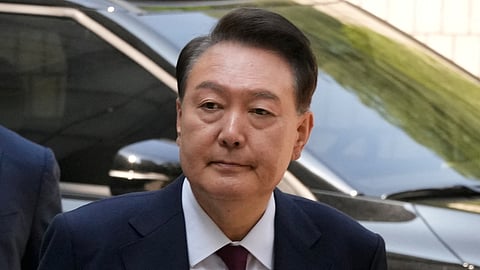 FILE PHOTO: South Korea's ousted President Yoon Suk Yeol, who is facing charges of orchestrating a rebellion when he declared martial law, arrives to attend his trial at the Seoul Central District Court in Seoul, South Korea, Monday, May 12, 2025. 

