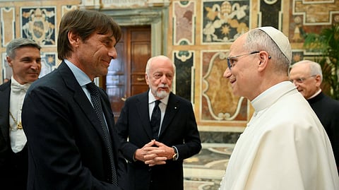 Pope Leo XIV meets with Napoli coach Antonio Conte and Napoli president Aurelio De Laurentiis after Serie A title victory, at the Vatican, May 27, 2025. 